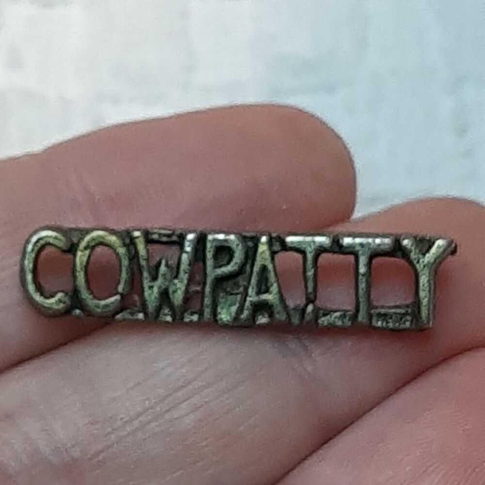 Vintage "COWPATTY" metal lapel tac pin Gold/Brass-Tone Western Poo Humor